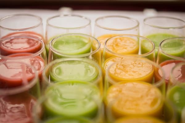 assorted smoothies on the fridge