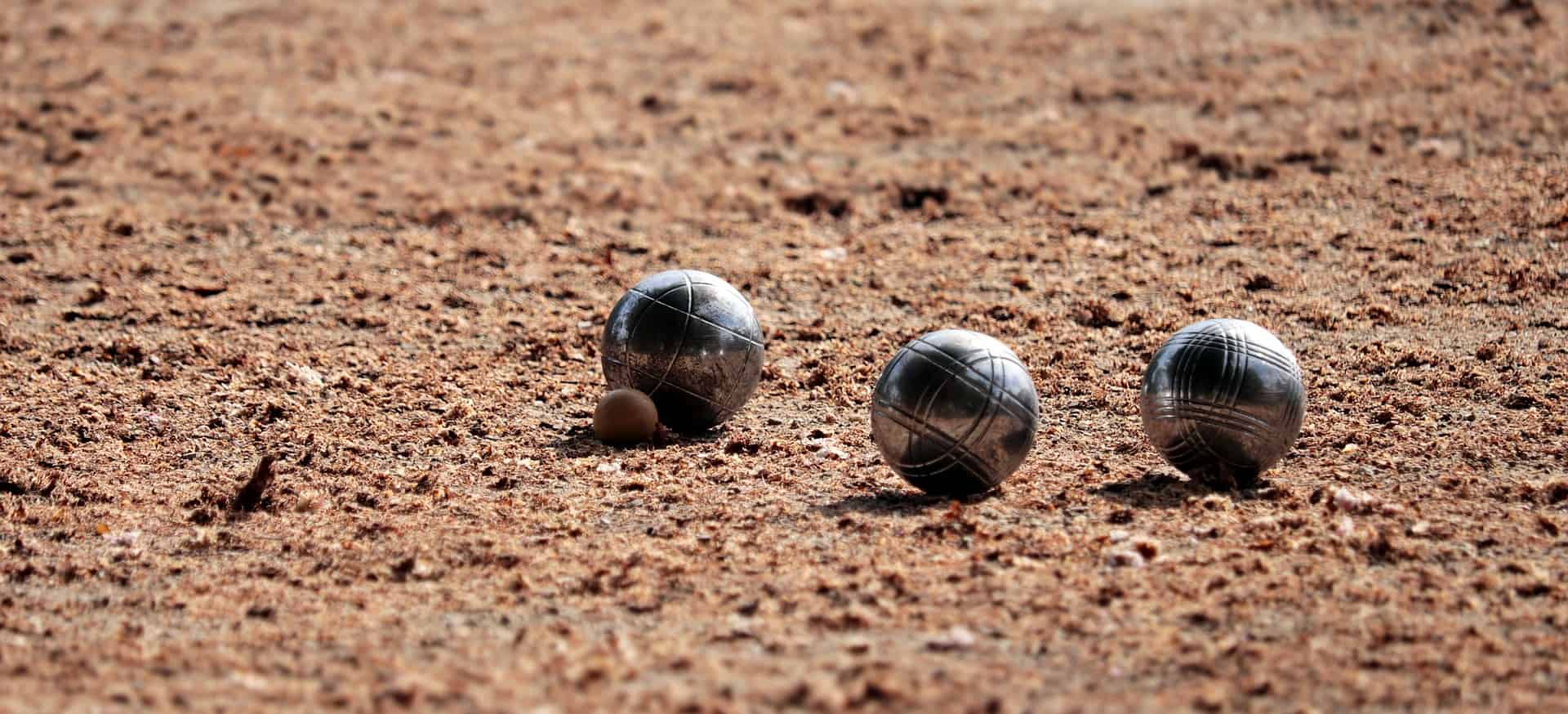 2 bocce ball at the ground